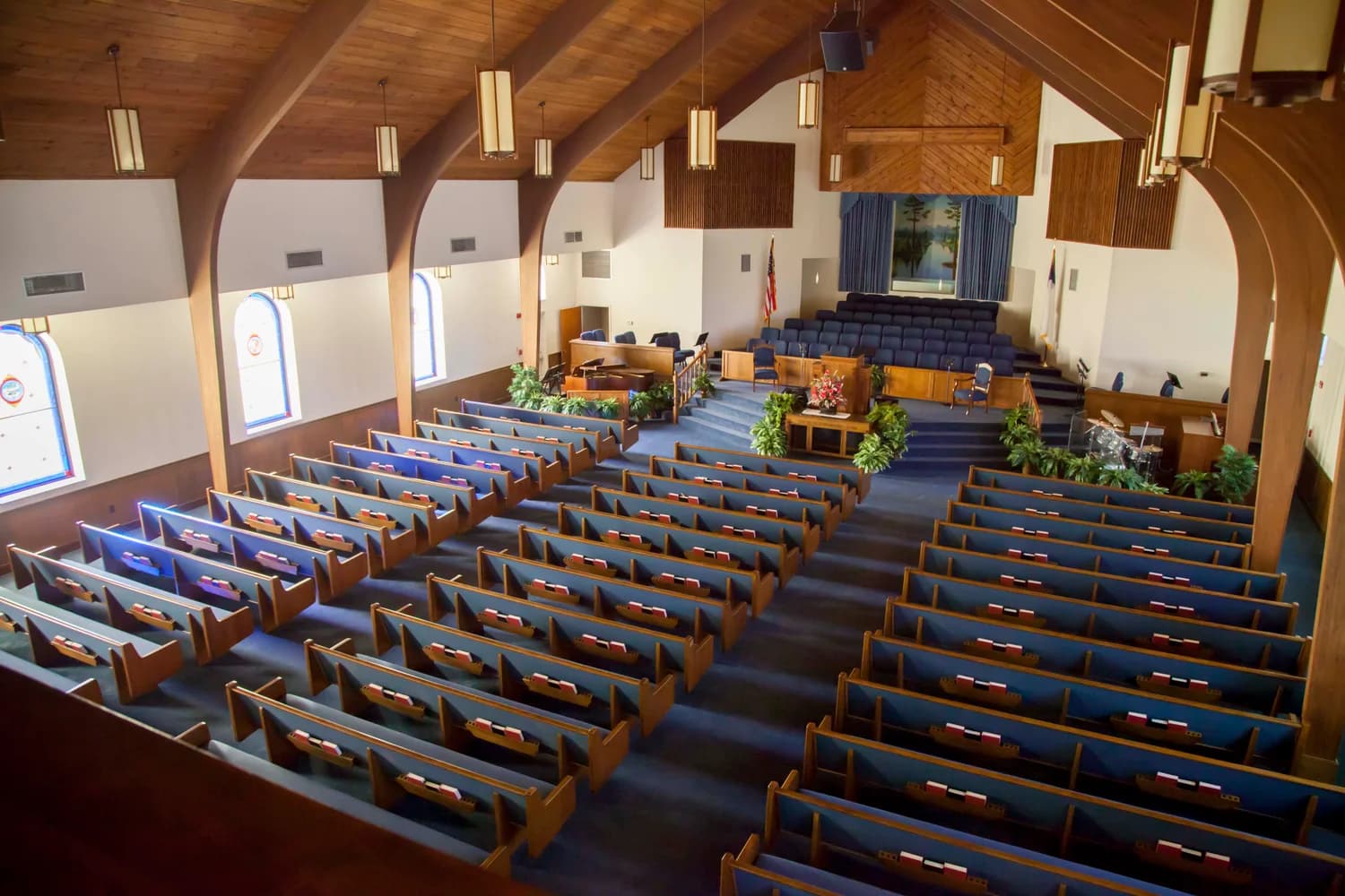 The warm wood ceilings and welcoming pews of Lone Oak Baptist Church